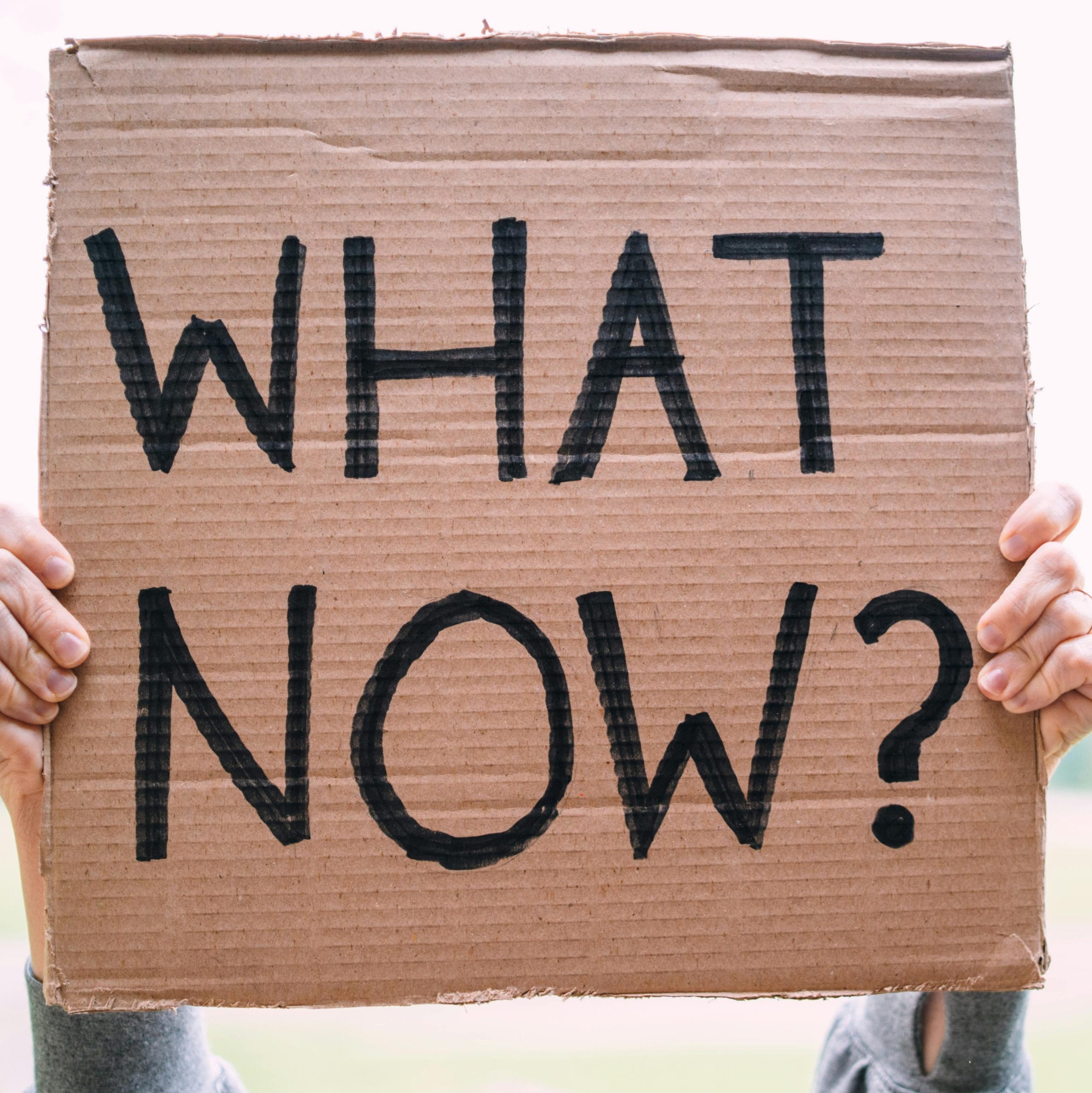 Cardboard sign reading 